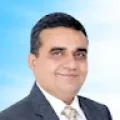 Dr.